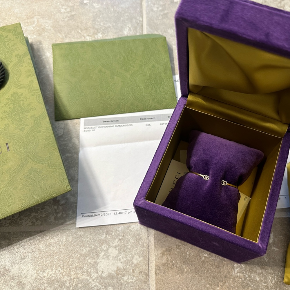 Gucci running cuff with diamonds